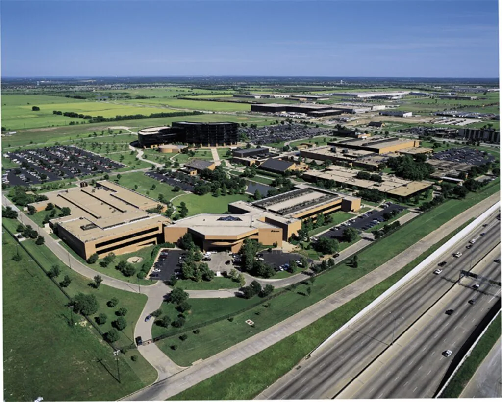Aerial view of an industrial facility and surrounding grounds