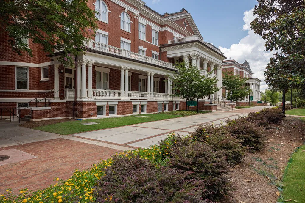 Tree-lined office building and landscaped grounds